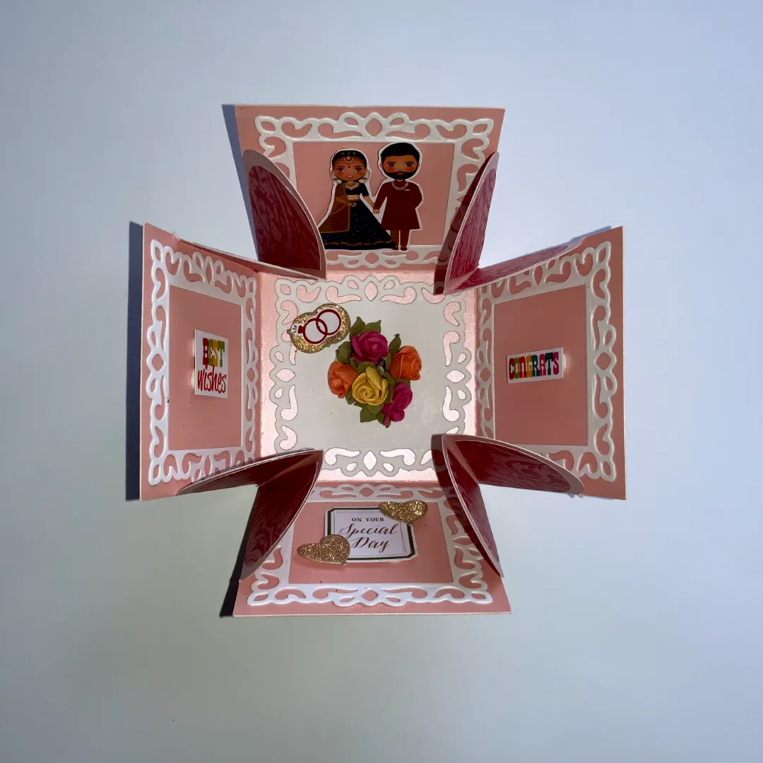handmade congratulations card with explosion box and embellishments