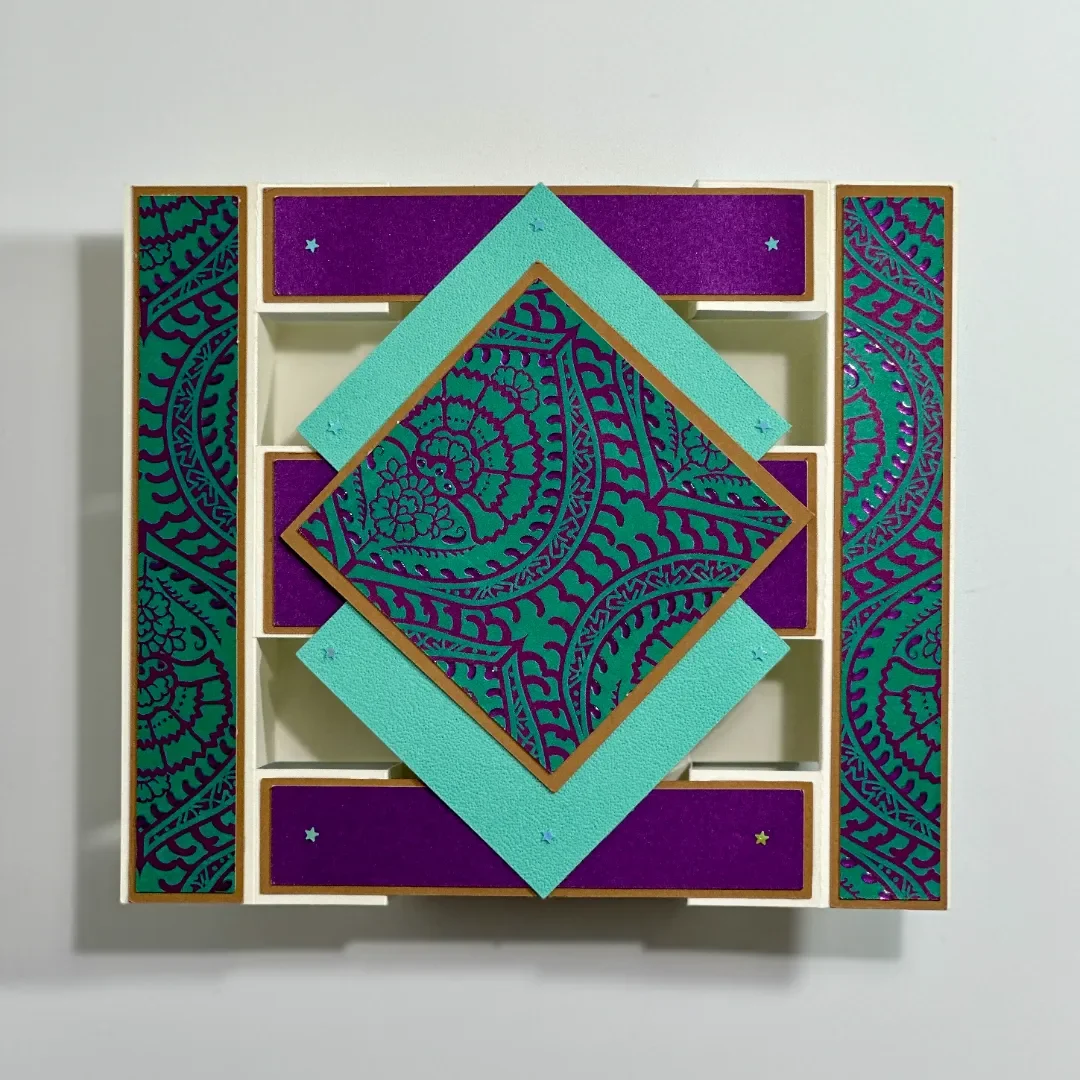 handmade diwali card in a fancy fold diamond tower card with multiple layers of patterned card and embellishments